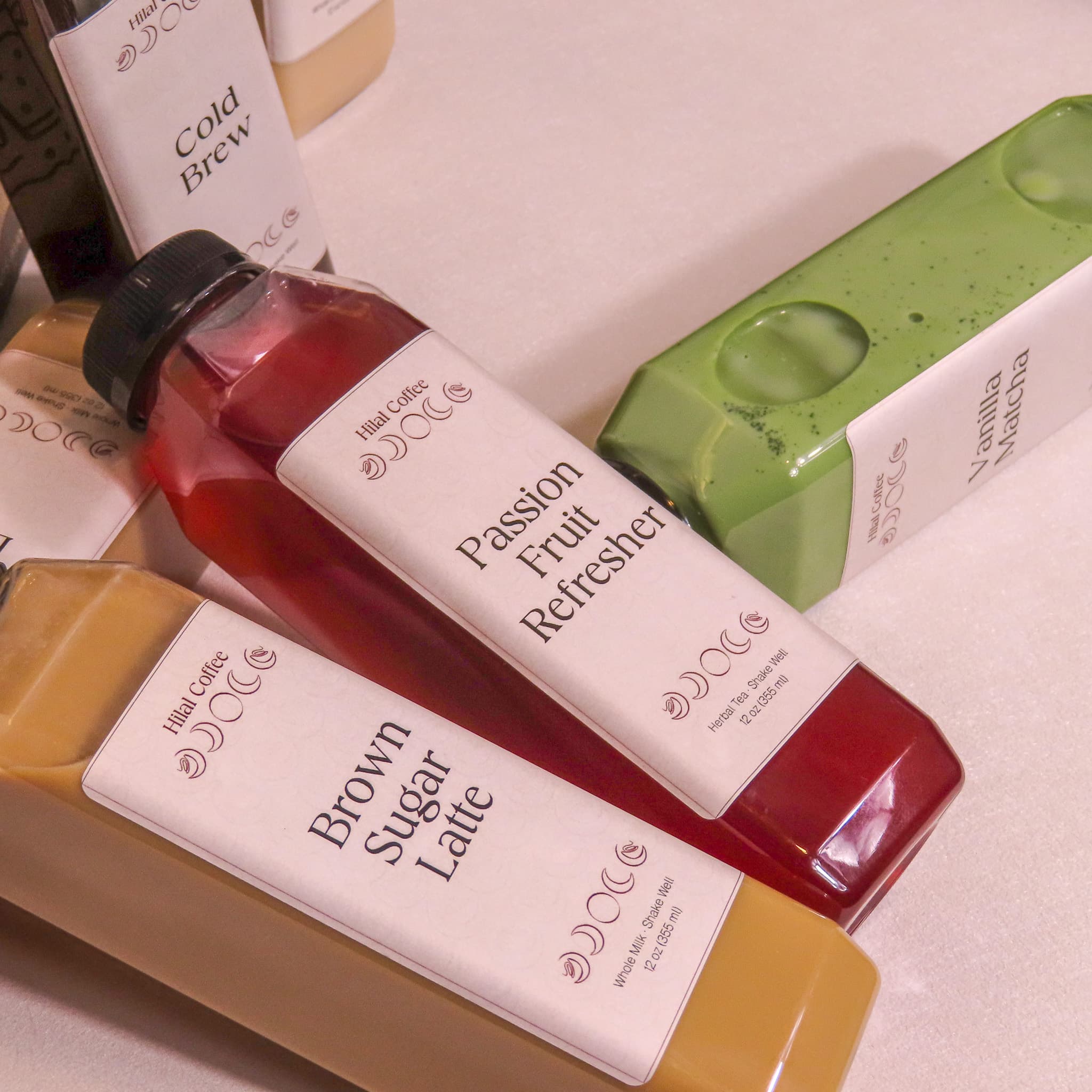 Hilal Coffee specialty lattes and matcha in branded bottles